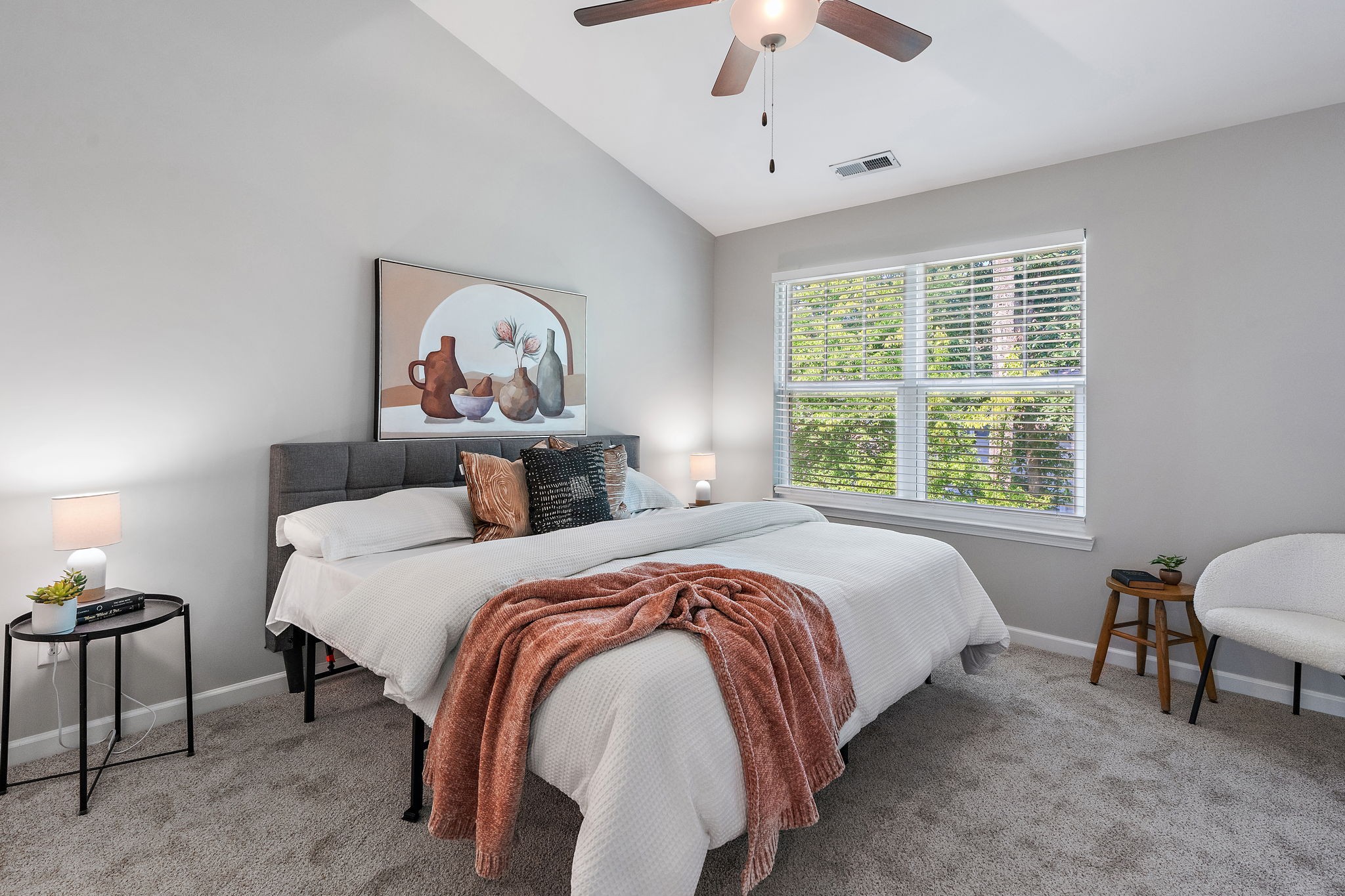 312 McKenzie Pass Madison, TN 37115 - Photo 13 of 21 a bedroom with a bed and a chandelier