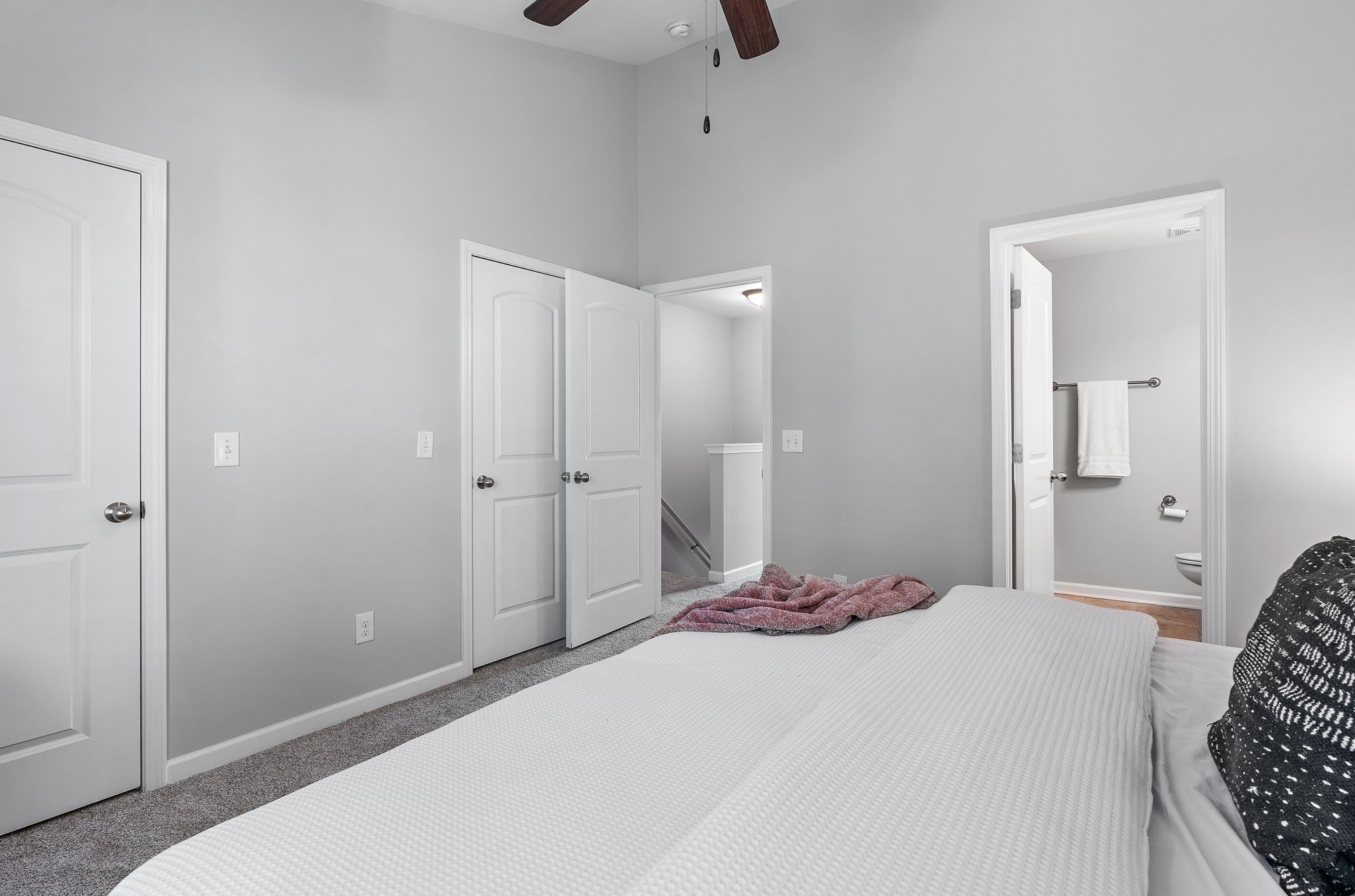 312 McKenzie Pass Madison, TN 37115 - Photo 14 of 21 a bedroom with a bed and a chandelier