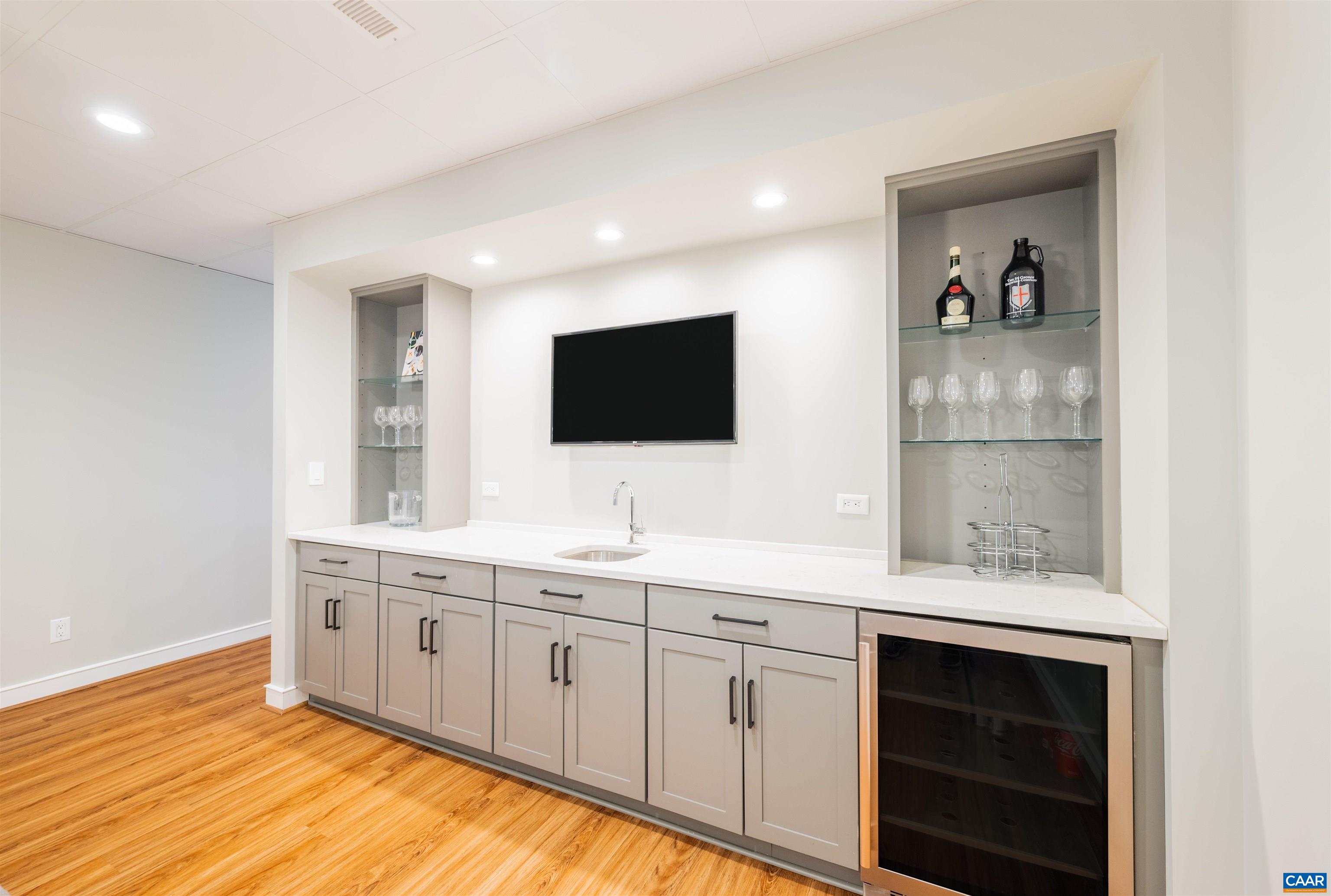 2519 White Hall Road Crozet, VA 22932 - Photo 54 of 69 a kitchen with a sink and a microwave