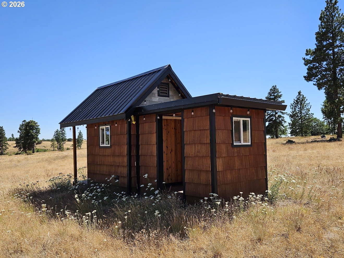67 Timber Lane Roosevelt, WA 99356 - Photo 28 of 37 a front view of a house with a yard