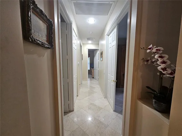 an aerial view of residential house with outdoor space swimming pool and outdoor seating