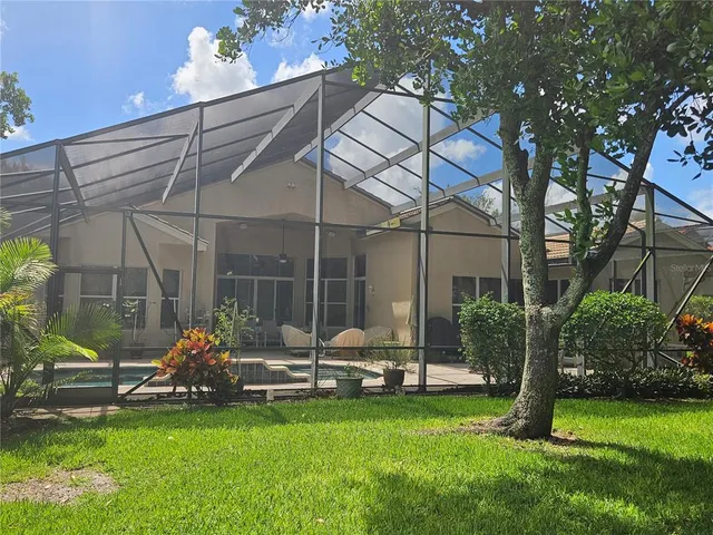 a view of a patio with couches chairs and a table and chairs