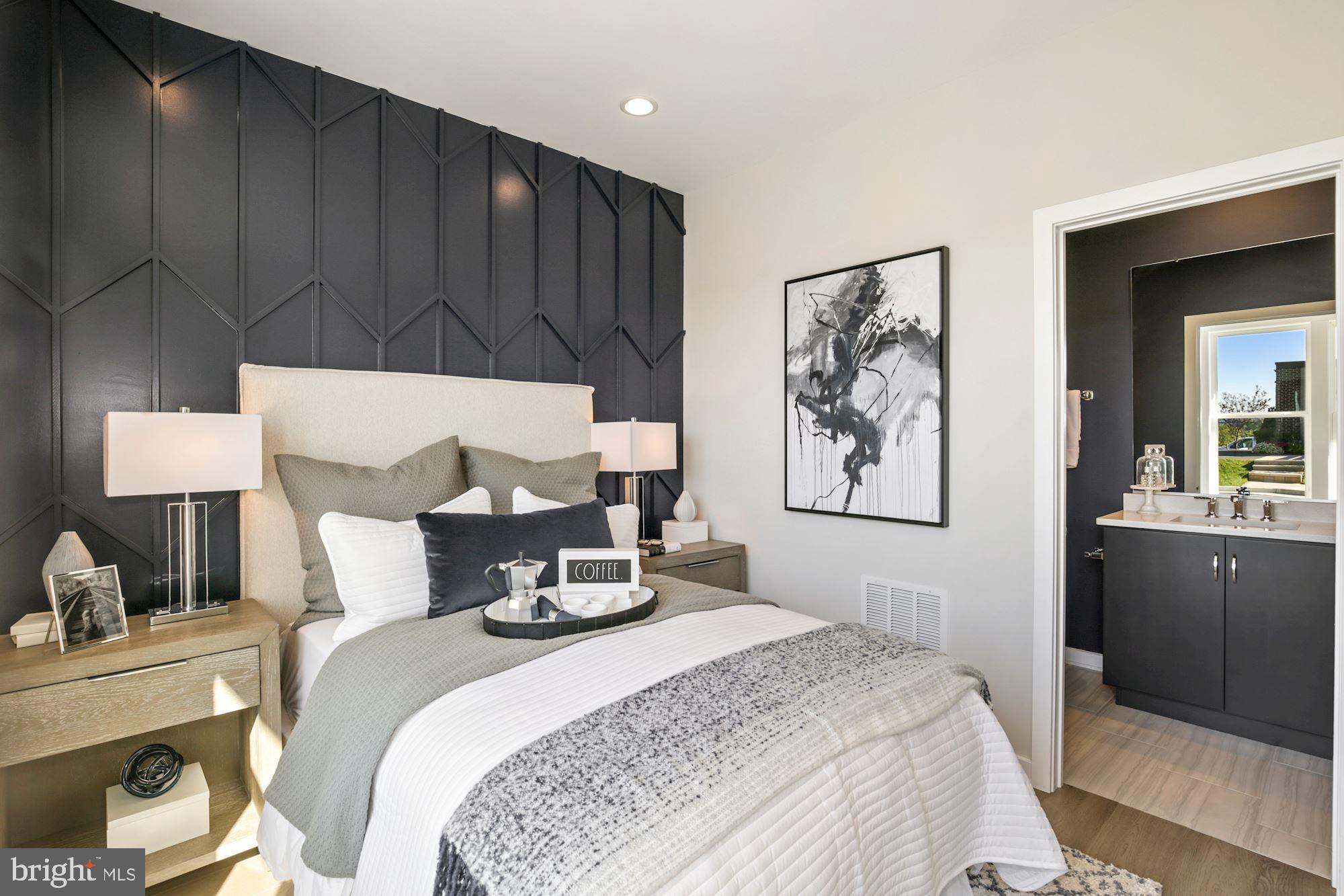 1772 Violet Ridge Place McLean, VA 22102 - Photo 7 of 19 a bedroom with a bed and wooden floor