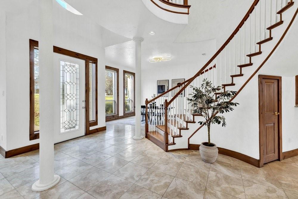 324 Rolling Oaks Ridge Cedar Hill, TX 75104 - Photo 12 of 39 a view of an entryway with staircase