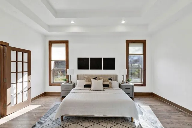 a bedroom with a bed and a dresser