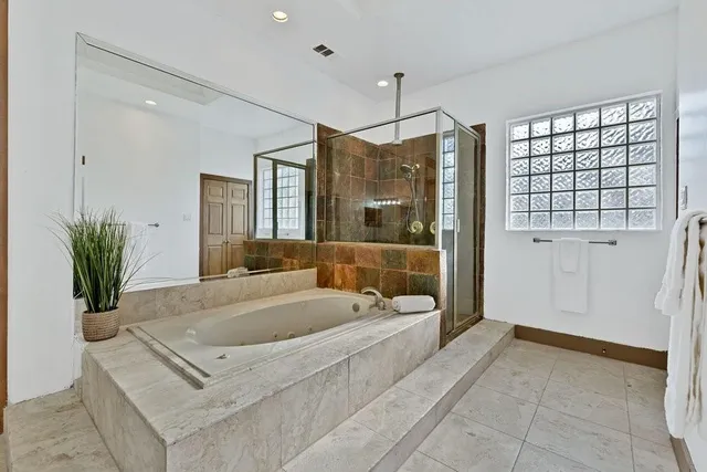 a view of cabinets with wooden floor and window