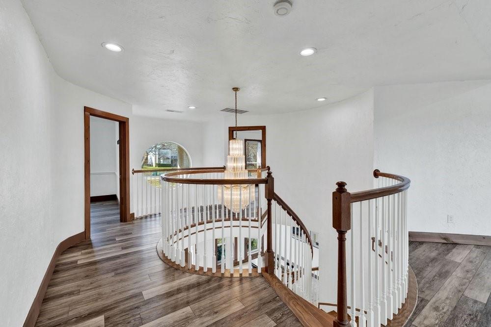 324 Rolling Oaks Ridge Cedar Hill, TX 75104 - Photo 23 of 39 a view of entryway with wooden floor