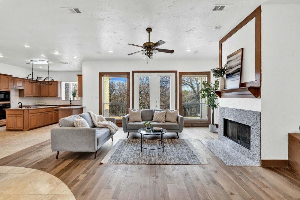 324 Rolling Oaks Ridge Cedar Hill, TX 75104 - Photo 5 of 39 a living room with furniture and a fireplace