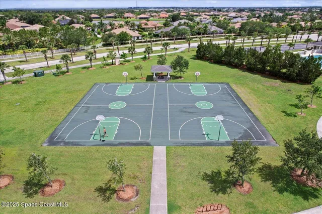 a view of a swimming pool and a yard
