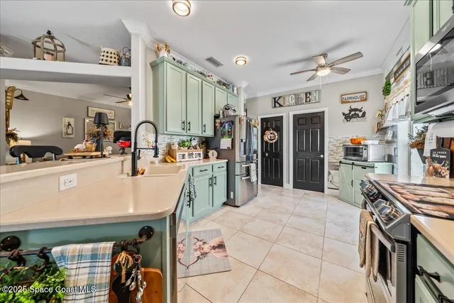 a kitchen with stainless steel appliances granite countertop a sink and cabinets