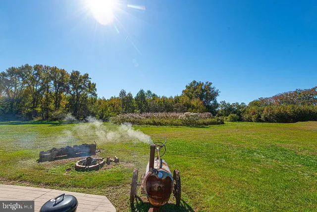 a en suite bathroom with a sink a toilet and a mirror
