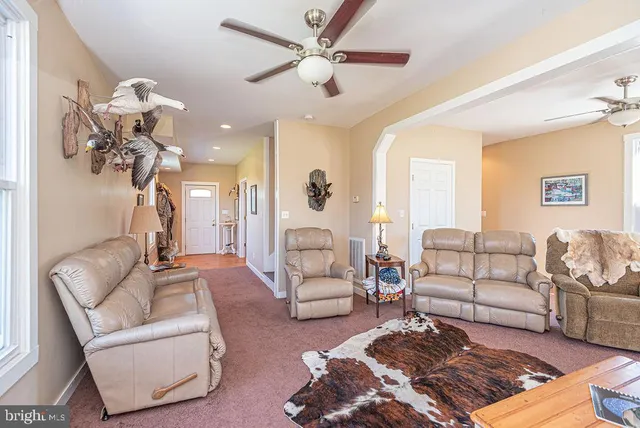 a bedroom with bed and window