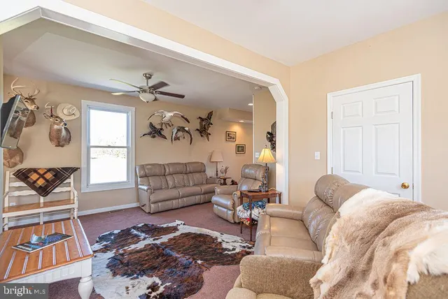 a bedroom with a bed and a table in it