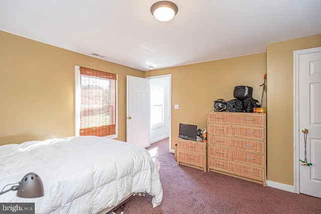 a view of a field with an ocean view