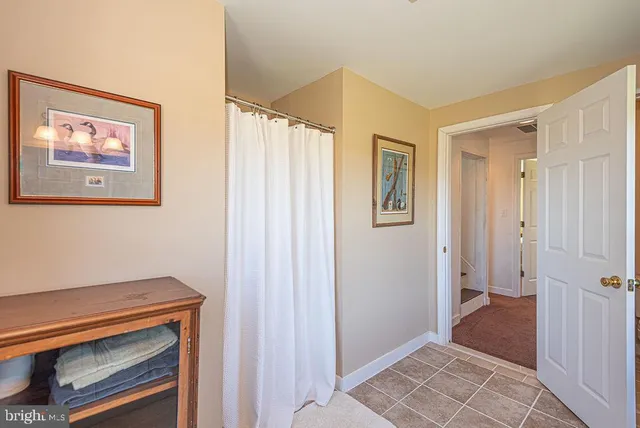 a terrace with a table and chairs