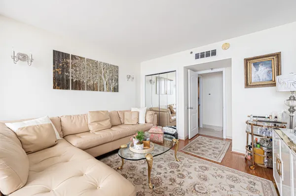a view of balcony with wooden floor