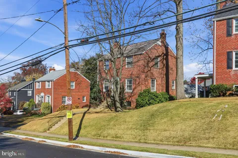 a view of a house with a street