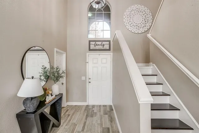 a view of entryway with wooden floor