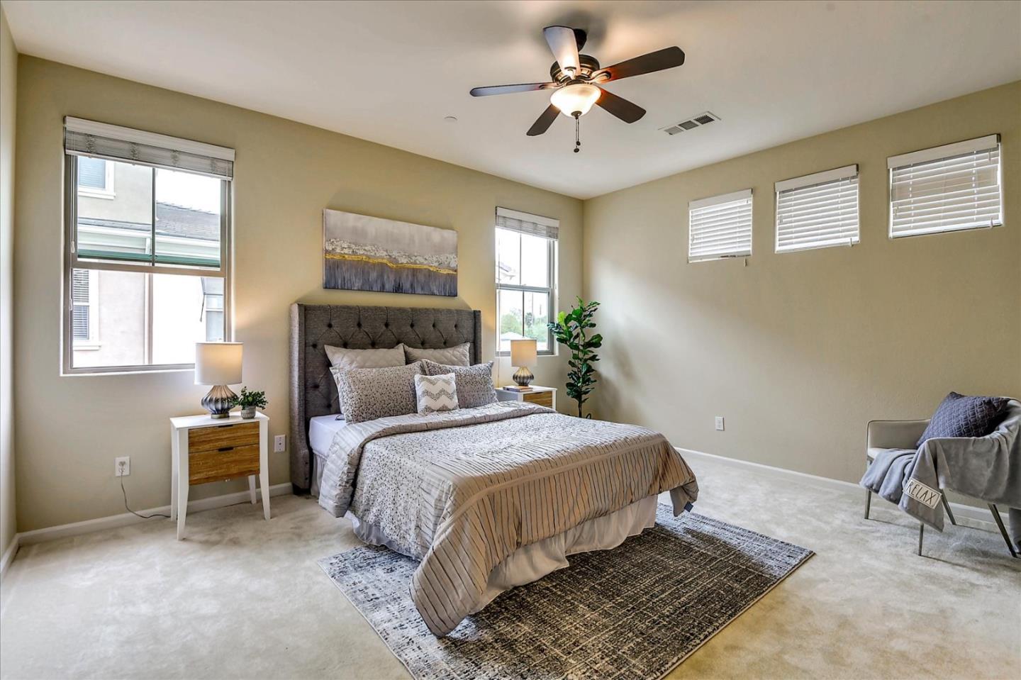 2038 Trento Loop Milpitas, CA 95035 - Photo 14 of 22 a bedroom with a bed and a window