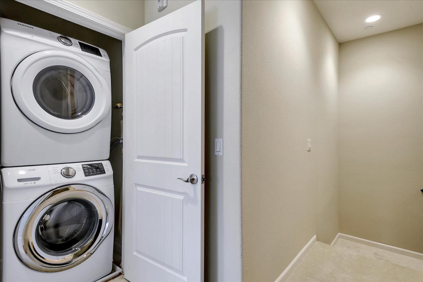 2038 Trento Loop Milpitas, CA 95035 - Photo 18 of 22 a utility room with dryer and washer