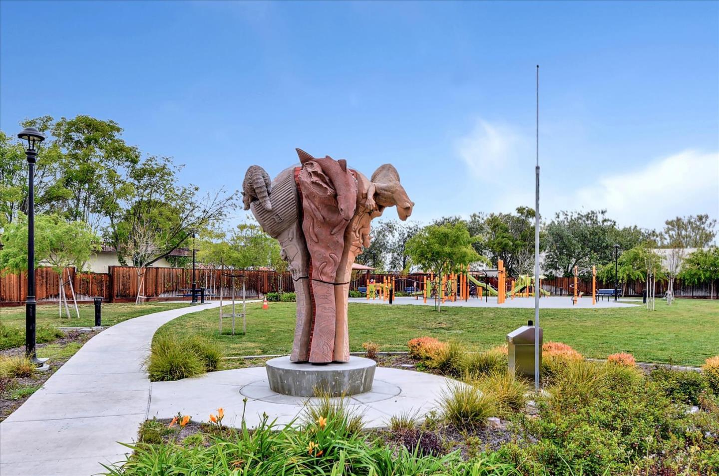 2038 Trento Loop Milpitas, CA 95035 - Photo 21 of 22 a park view with a fountain in front of it