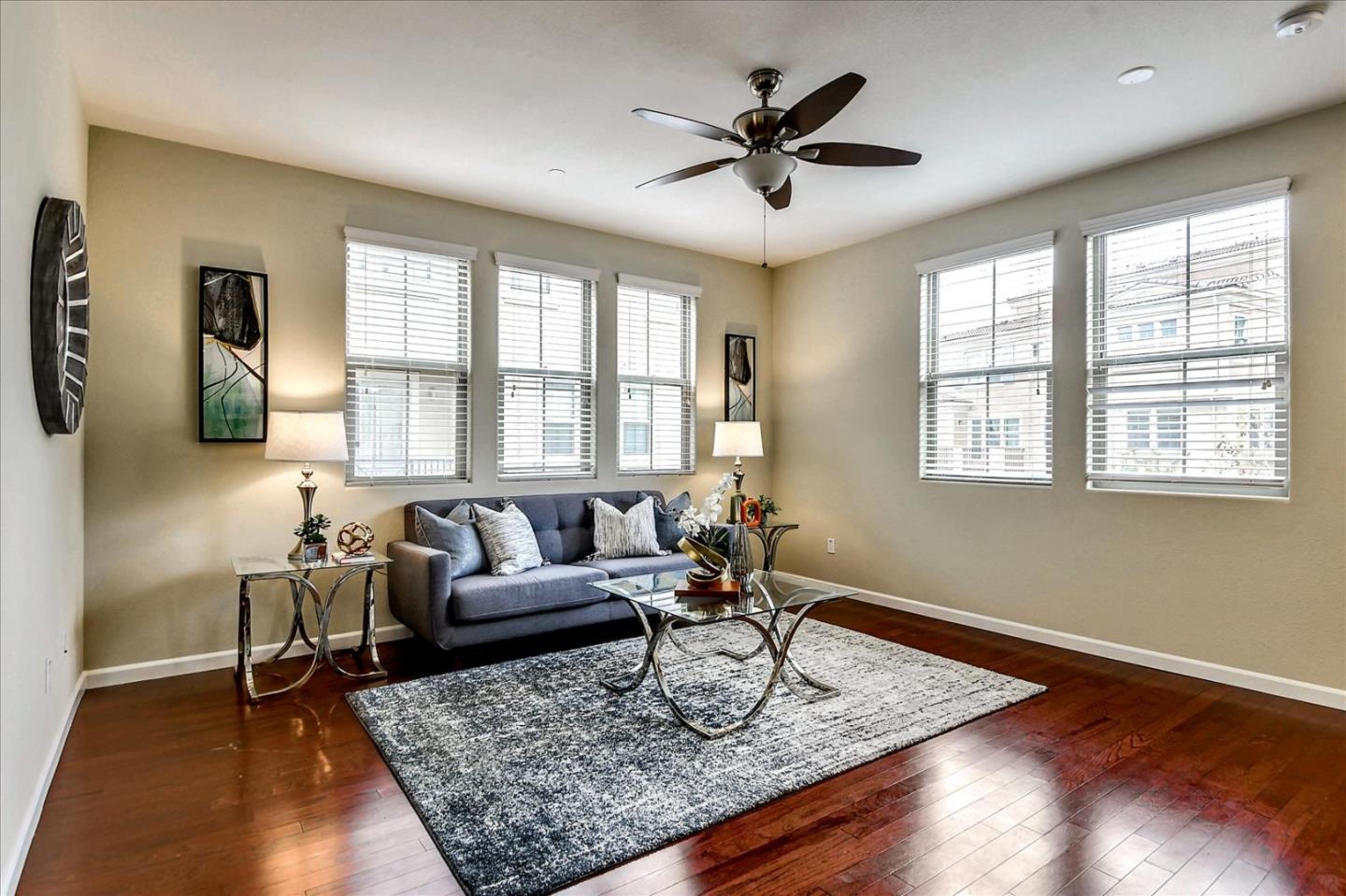 2038 Trento Loop Milpitas, CA 95035 - Photo 3 of 22 a living room with furniture and a rug