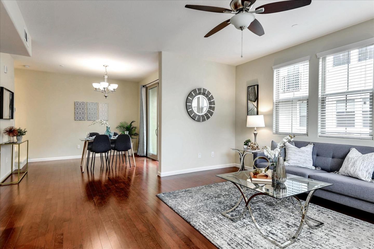 2038 Trento Loop Milpitas, CA 95035 - Photo 4 of 22 a living room with furniture and wooden floor