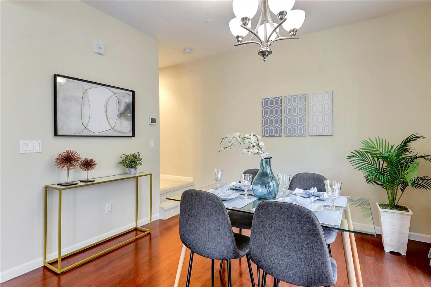 2038 Trento Loop Milpitas, CA 95035 - Photo 9 of 22 a dining room with furniture and wooden floor