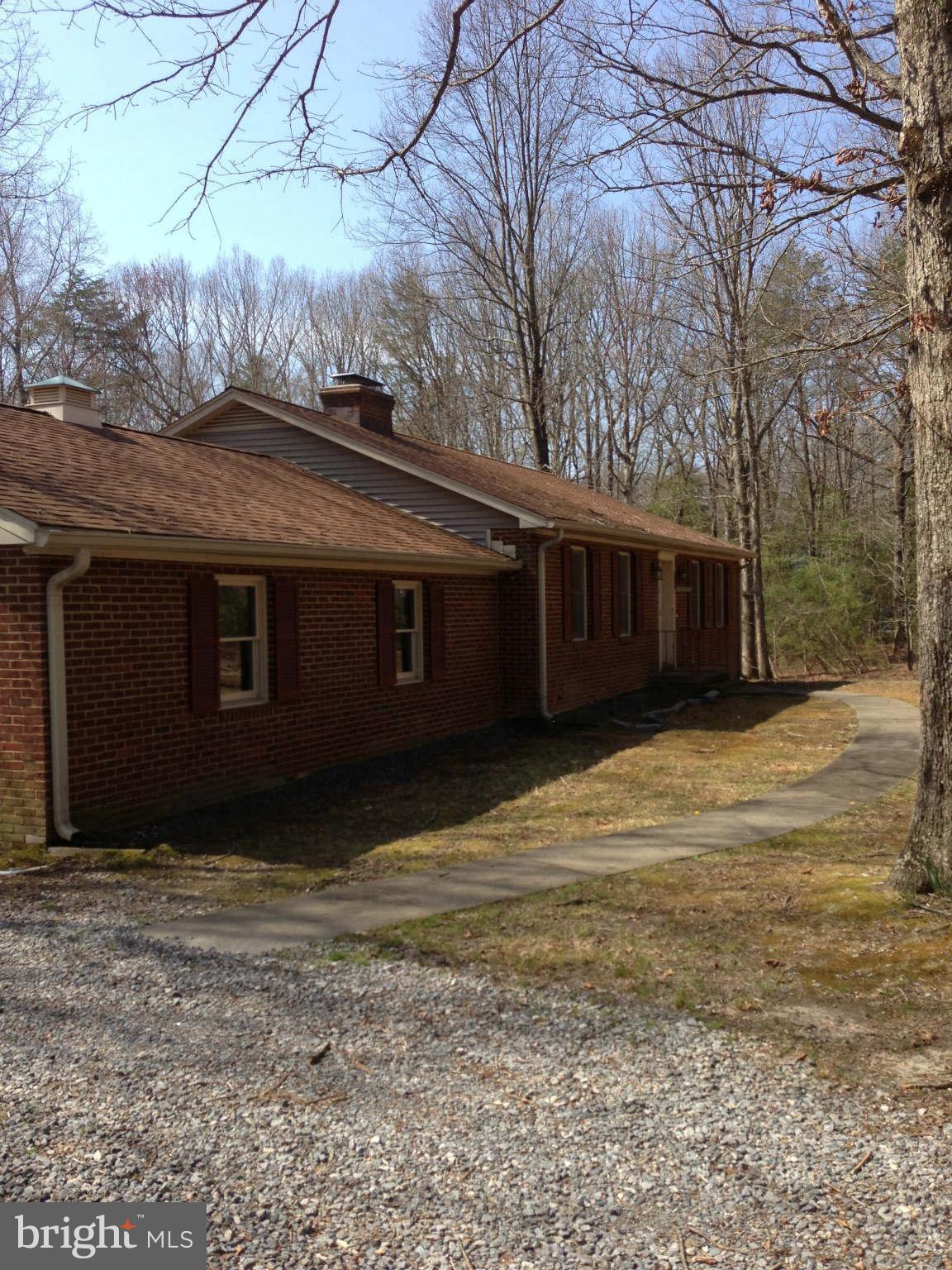 7602 River Road Fredericksburg, VA 22407 - Photo 3 of 7 a view of a house with a yard