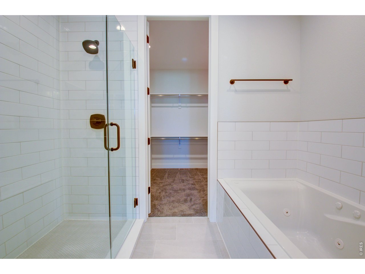 5705 2nd Road Greeley, CO 80634 - Photo 26 of 46 The primary ensuite bathroom has is fully equipped with nothing but the best quality fixtures and finishes