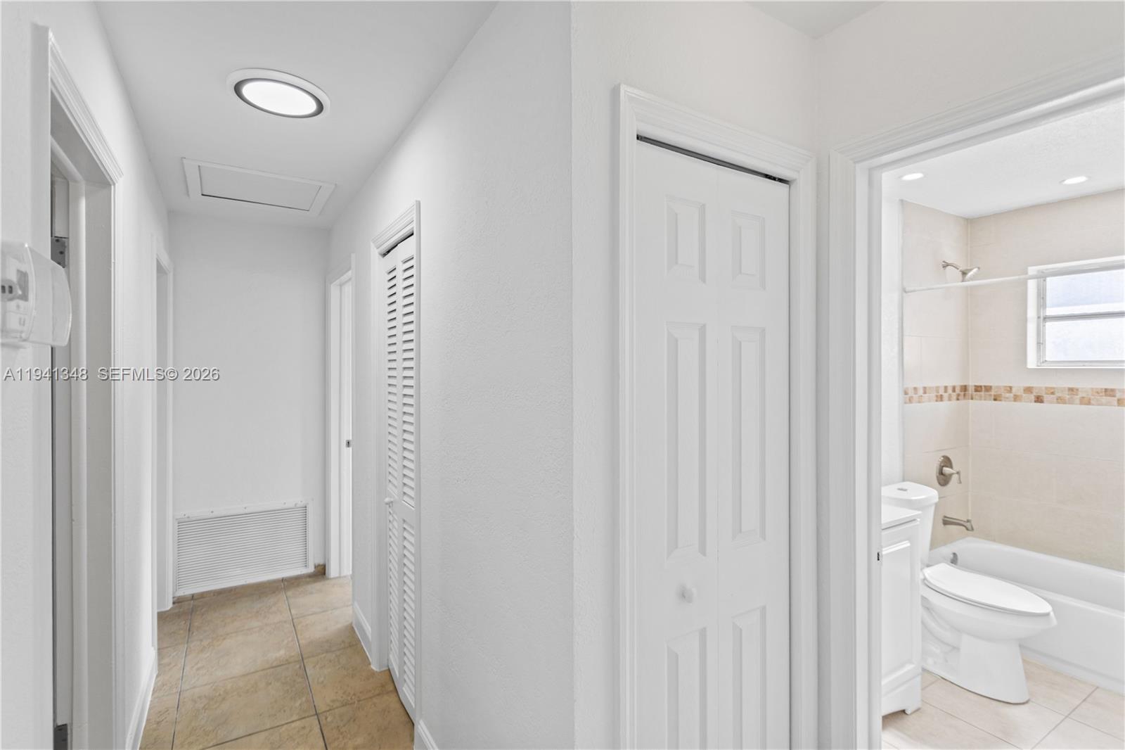 3253 Pierce Street Hollywood, FL 33021 - Photo 12 of 53 a bathroom with a toilet a sink and a shower