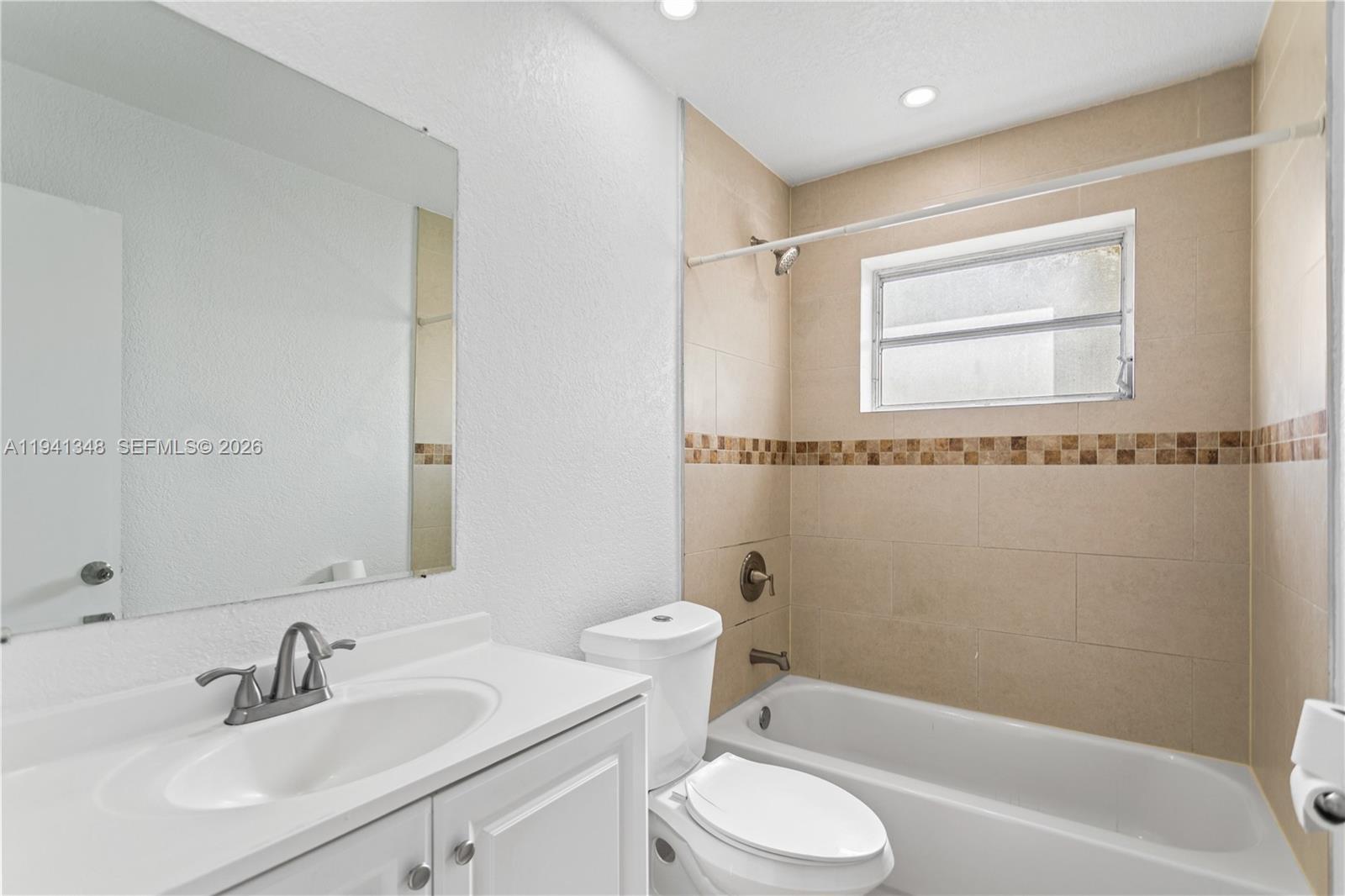 3253 Pierce Street Hollywood, FL 33021 - Photo 13 of 53 a bathroom with a sink toilet and shower