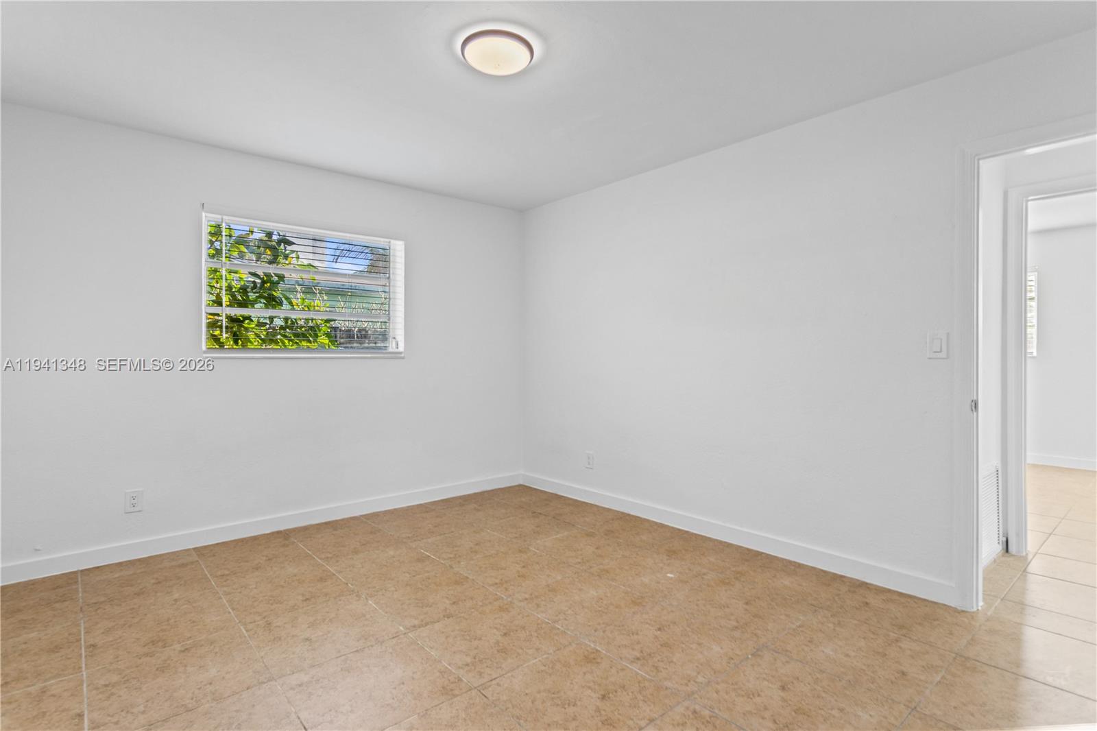 3253 Pierce Street Hollywood, FL 33021 - Photo 19 of 53 an empty room with windows