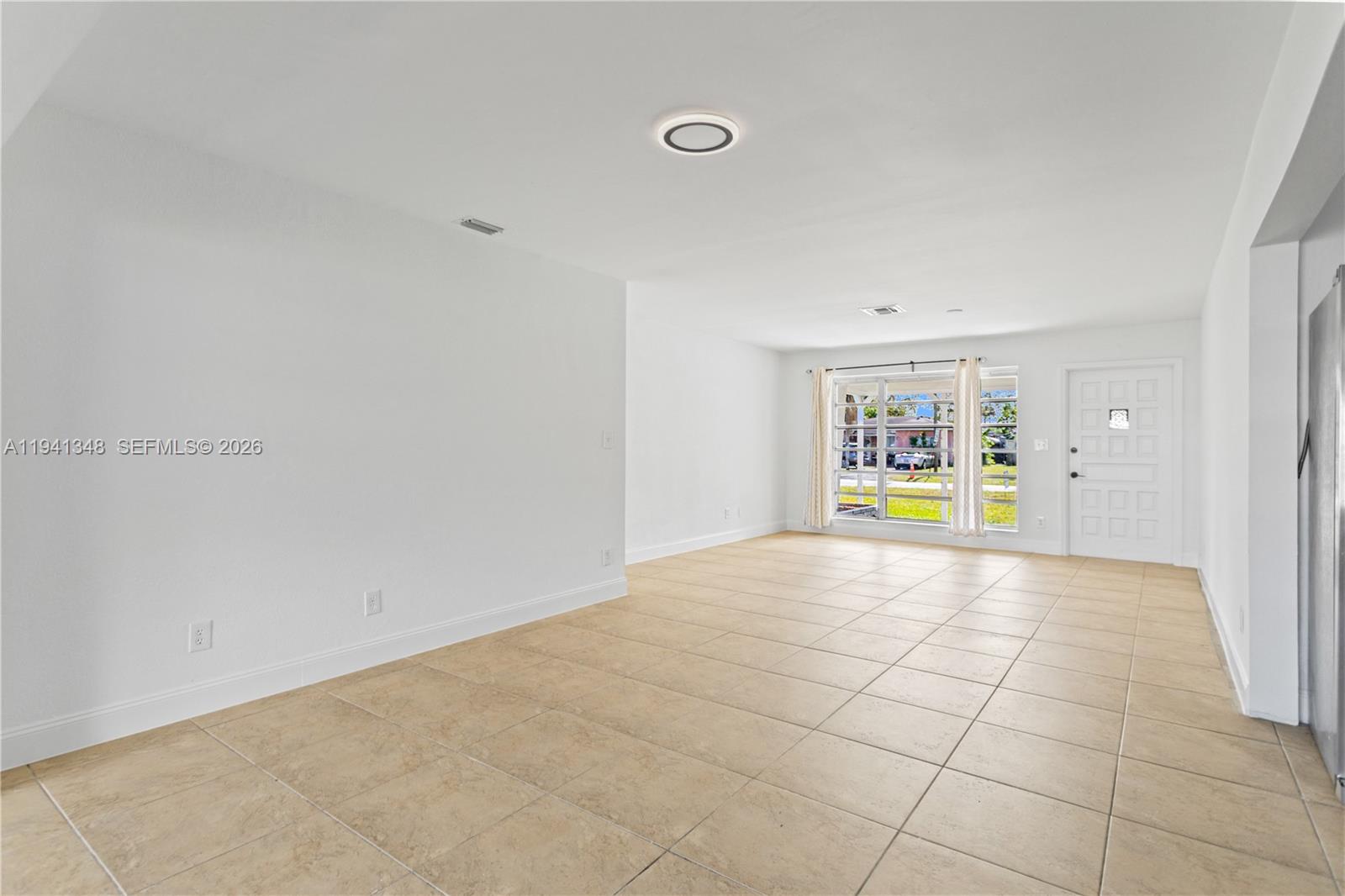 3253 Pierce Street Hollywood, FL 33021 - Photo 30 of 53 a view of kitchen and an empty room