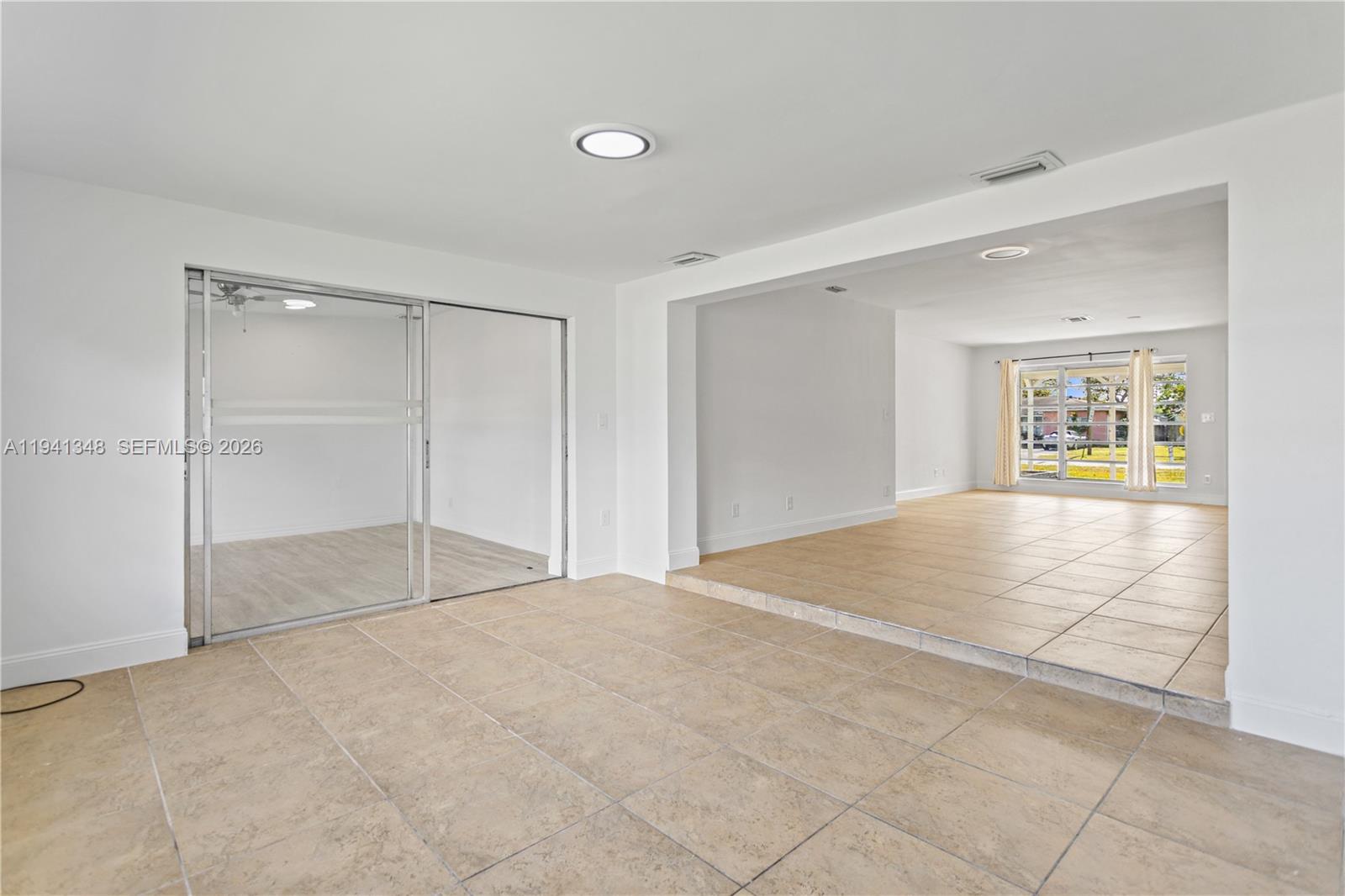 3253 Pierce Street Hollywood, FL 33021 - Photo 43 of 53 a room that has a bed and a window