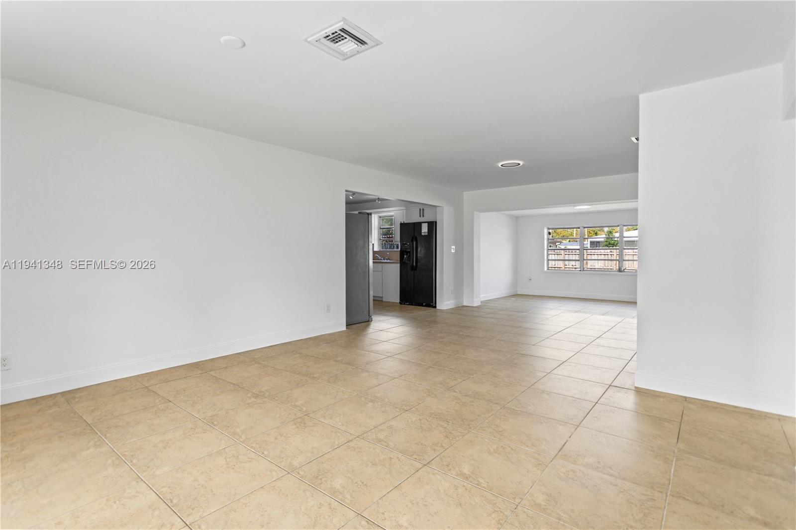 3253 Pierce Street Hollywood, FL 33021 - Photo 50 of 53 a view of an empty room with a window