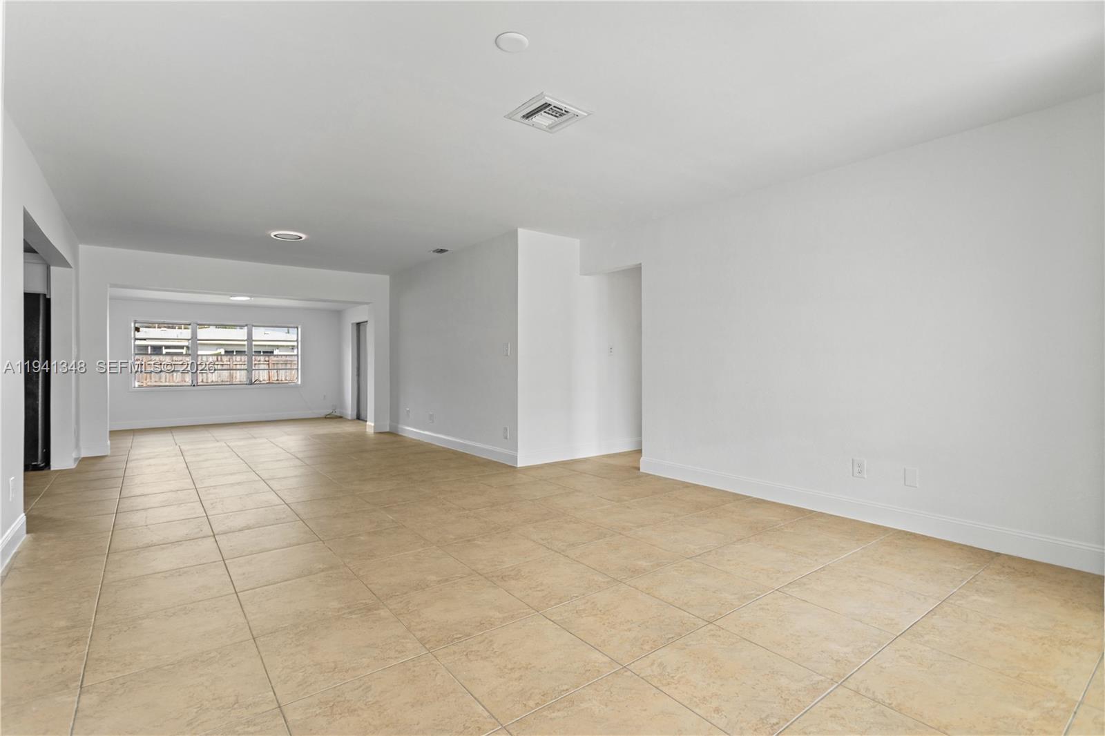 3253 Pierce Street Hollywood, FL 33021 - Photo 53 of 53 a view of an empty room and a window