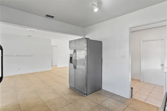 a bathroom with a toilet a sink and a shower