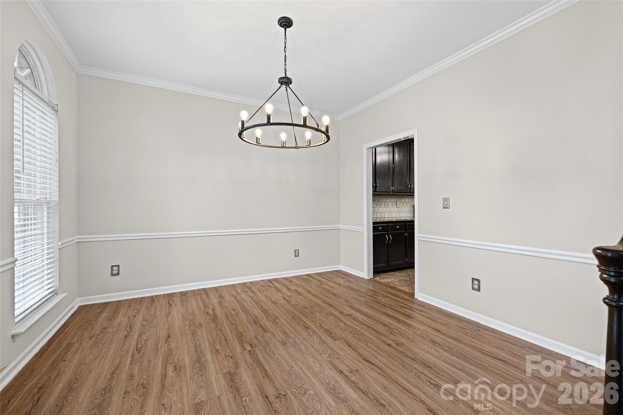 620 East Cheval Drive Fort Mill, SC 29708 - Photo 8 of 48 wooden floor in an empty room with a window