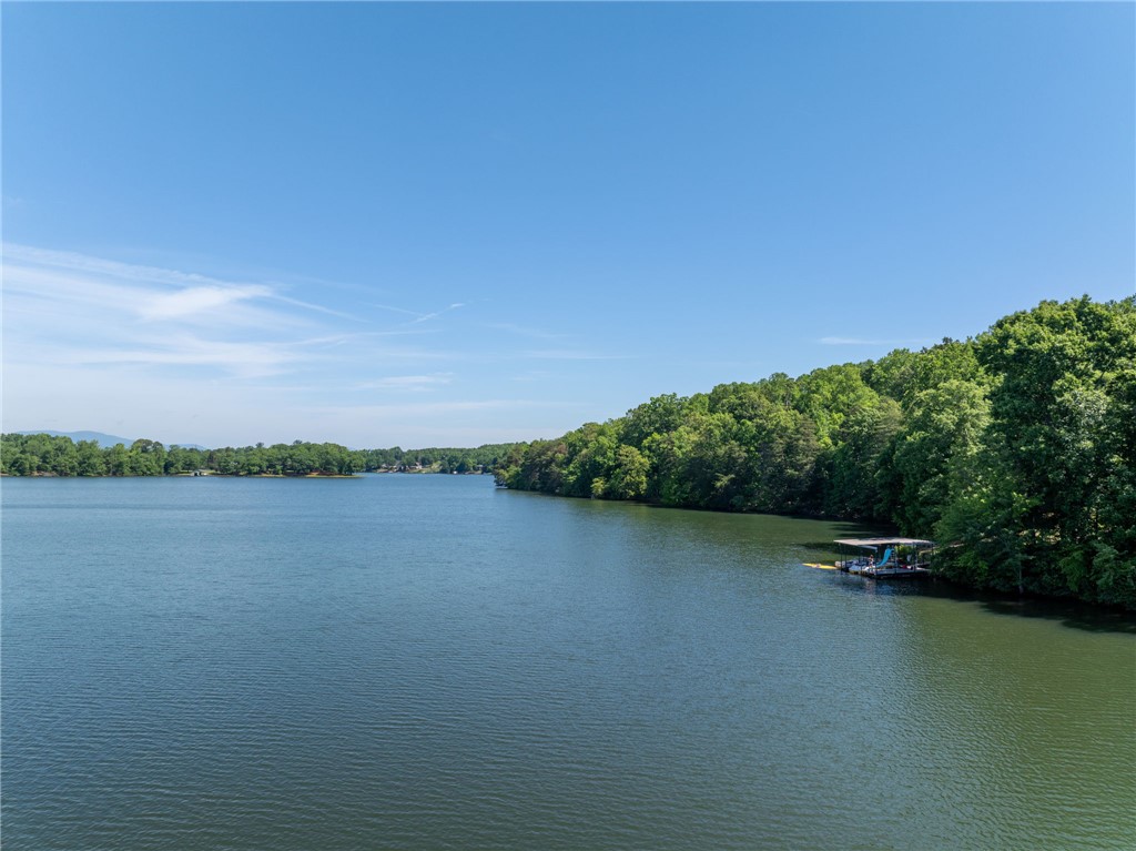 0 Ben Hurt Road Lyman, SC 29365 - Photo 15 of 21 A tranquil lake view awaits, complete with a private dock for aquatic adventures.