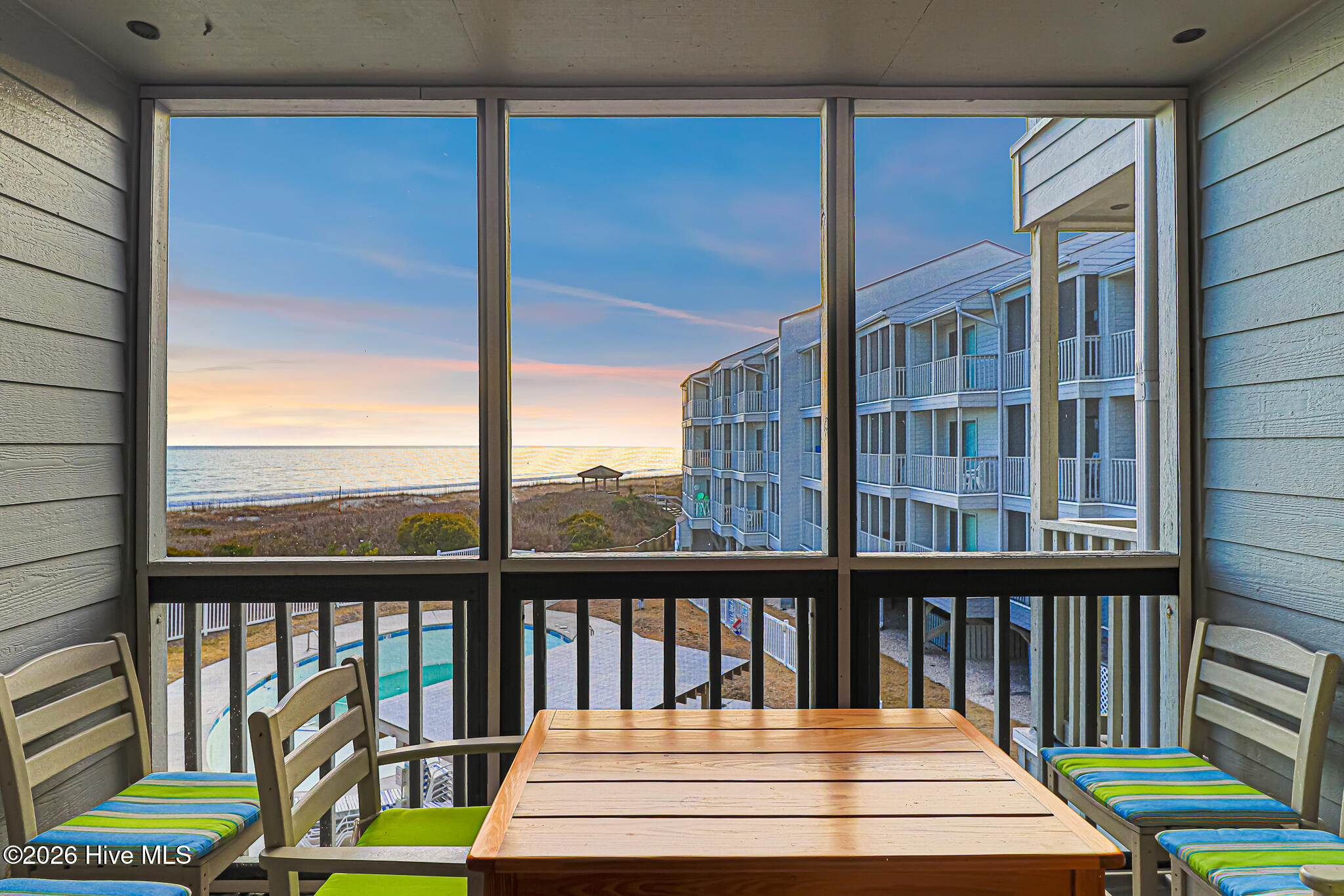 2111 West Fort Macon Road, Unit 211 DUNESCAPE Atlantic Beach, NC 28512 - Photo 3 of 39 Screened Porch