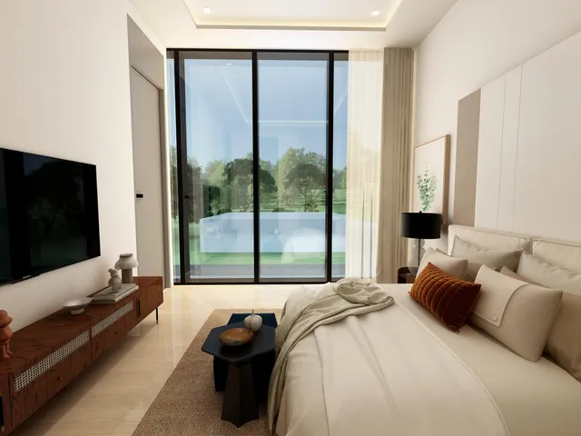 a bedroom with a bed and large window