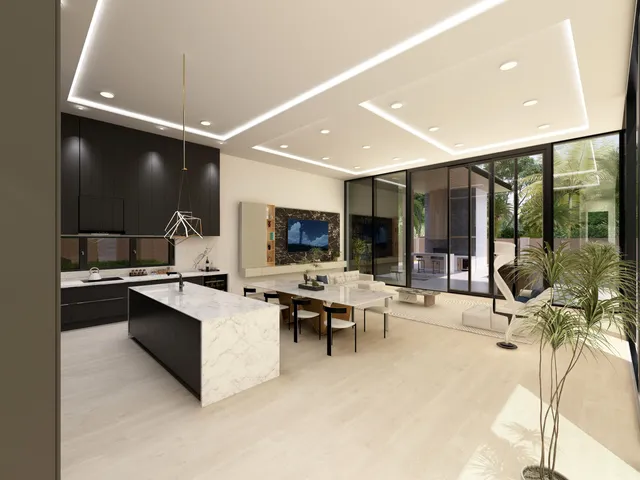 a living room with stainless steel appliances furniture a rug and a projector