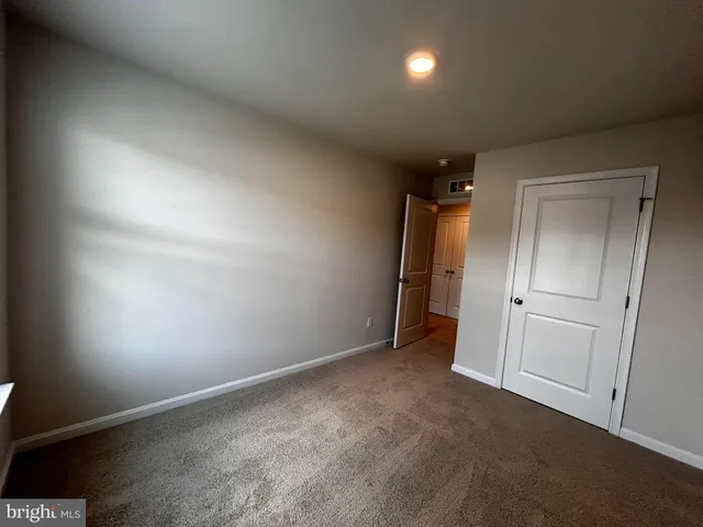 an empty room with an entryway