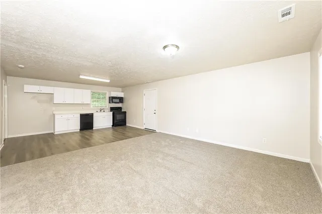 a view of a kitchen with a sink