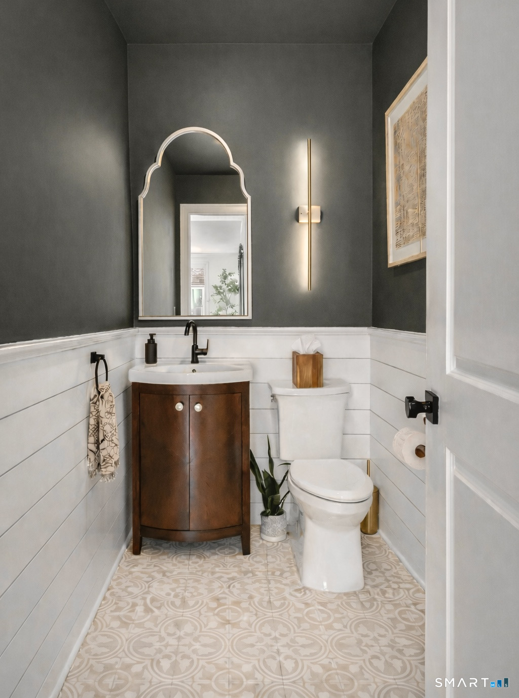 34 Orchard Road Milford, CT 06460 - Photo 11 of 25 a bathroom with a sink toilet and mirror