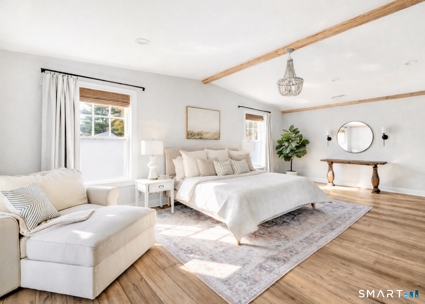 34 Orchard Road Milford, CT 06460 - Photo 12 of 25 a bed room with a bed and a couch