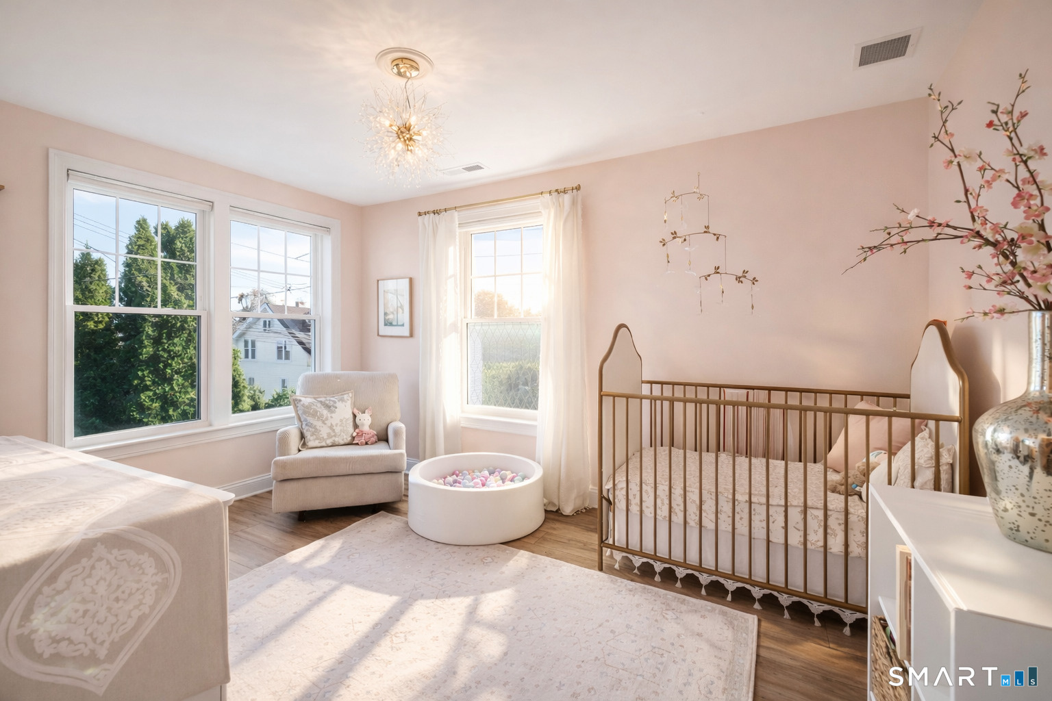 34 Orchard Road Milford, CT 06460 - Photo 18 of 25 a bedroom with furniture and windows