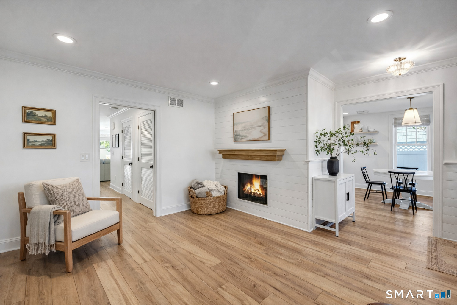 34 Orchard Road Milford, CT 06460 - Photo 3 of 25 a living room with furniture and a fireplace
