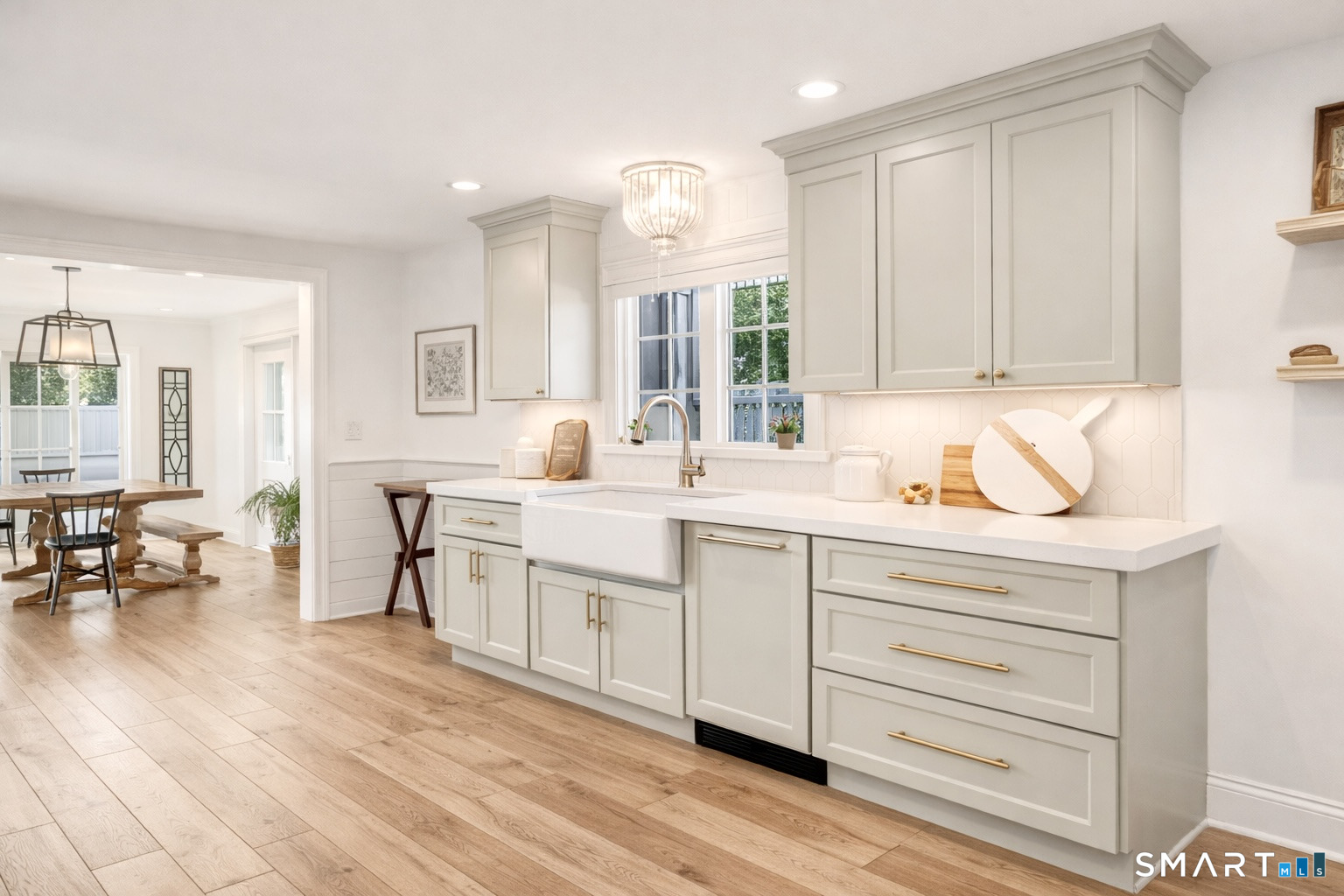 34 Orchard Road Milford, CT 06460 - Photo 5 of 25 a kitchen with a sink cabinets and window